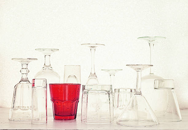 istock Glass goblets of different shapes on a white background 629405922