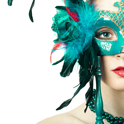Beauty model woman wearing venetian masquerade carnival mask. Christmas and new year. Perfect makeup