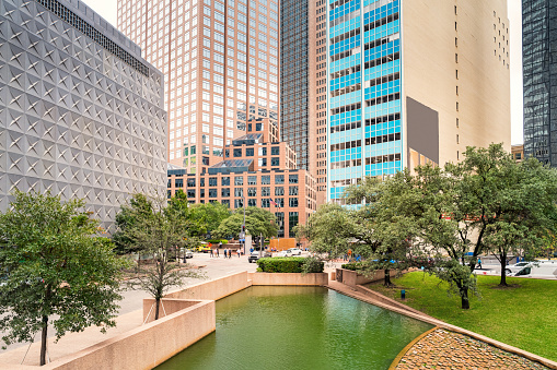 Stock photo of Thanksgiving Square and office buildings in Downtown Dallas, Texas, USA.