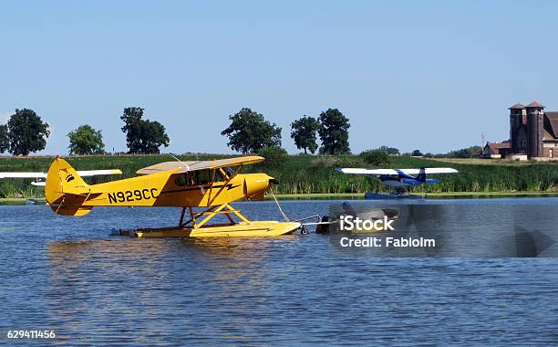 Amphibious Aircraft Being Transported In A Lake Stock Photo - Download Image Now - Oshkosh - Wisconsin, Accessibility, Air Vehicle