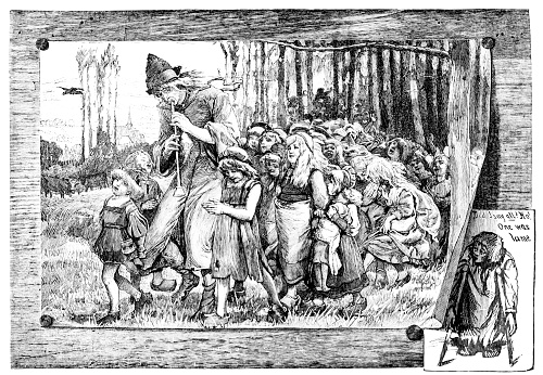Pied Piper of Hamelin leading children away, famous fable, from an 1886 antique book \