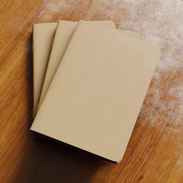 istock Concept of three blank notebook with brown craft paper cover 629420558