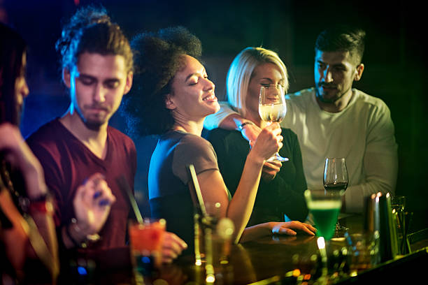 istock People in the bar 629421188