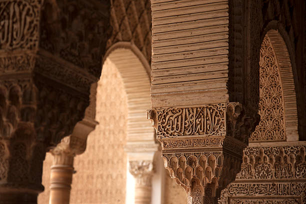 Wooden slat ceiling painted with traditional Moroccan motifs.