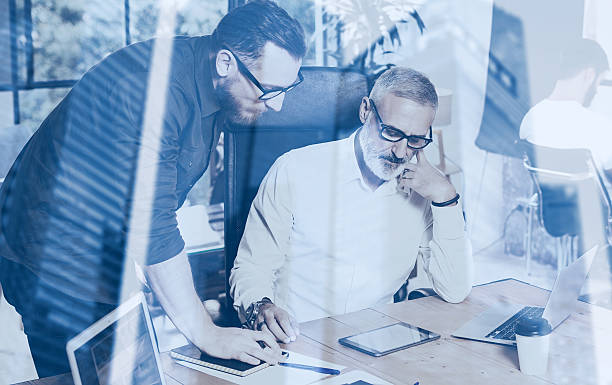 istock Double exposure concept.Team of business people making great work 629428108