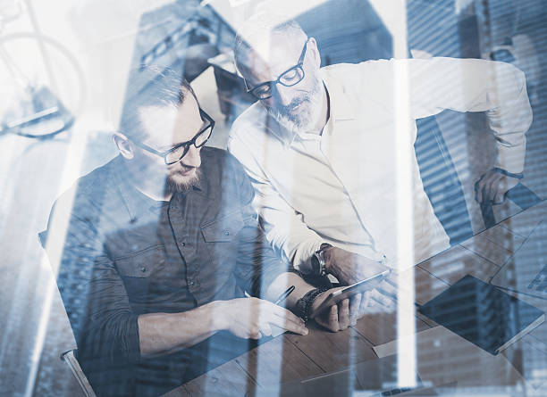istock Double exposure concept.Team of business people making great time 629428830