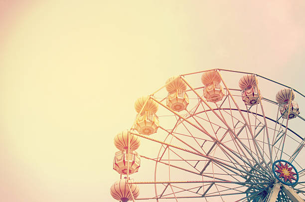 istock Ferris wheel on sky background with sunlight 629434760