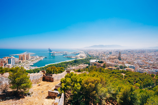 Cityscape Panoramic View Of Malaga, Spain. View From Old Medieval Fortress.