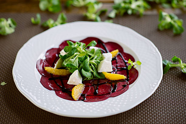istock Healthy Vegetarian Beetroot and Orange Salad with Goat Cheese 629442186