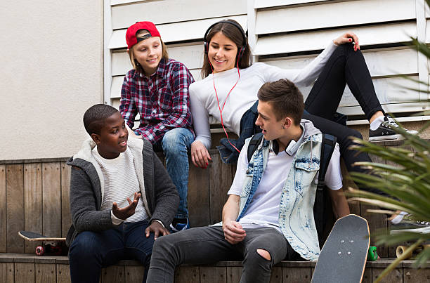 istock teens spending time together  in sunny day 629443814