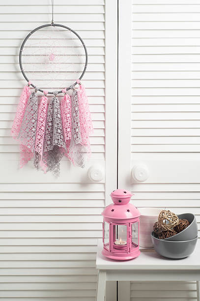 istock Pink beige dream catcher with crocheted doilies 629444128