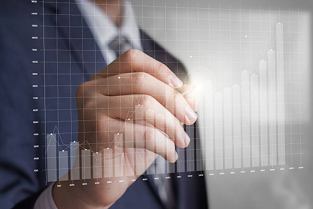istock Business man draws a profit growth chart. 629447098