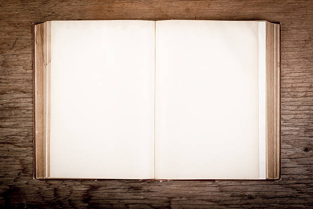 istock old book on a wooden table 629456468