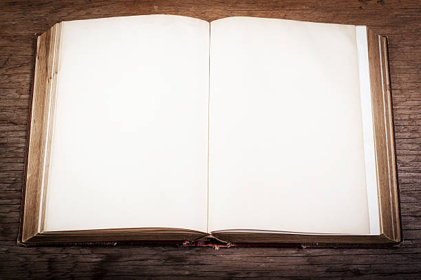 istock old book on a wooden table 629456510