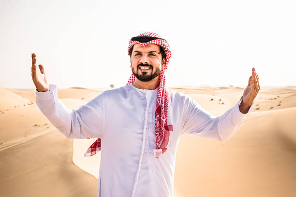 istock arabic sheik on the deser praying 629457716