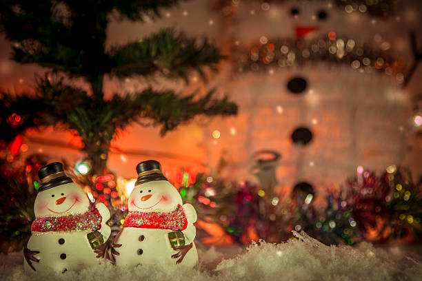 istock snowman and ornament in snow christmas item 629458894