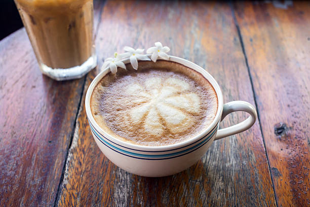 istock Coffee latte cup with milk on the table 629461858
