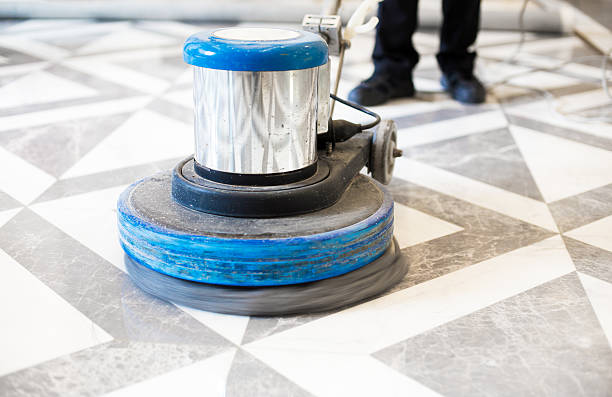 istock man polishing marble floor in modern office building 629481552