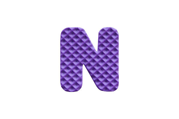 istock purple alphabet N made from EVA foam on white background 629482782