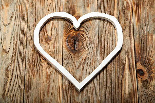 istock Holidays gift and heart on wooden rustic background. Valentines day 629484132