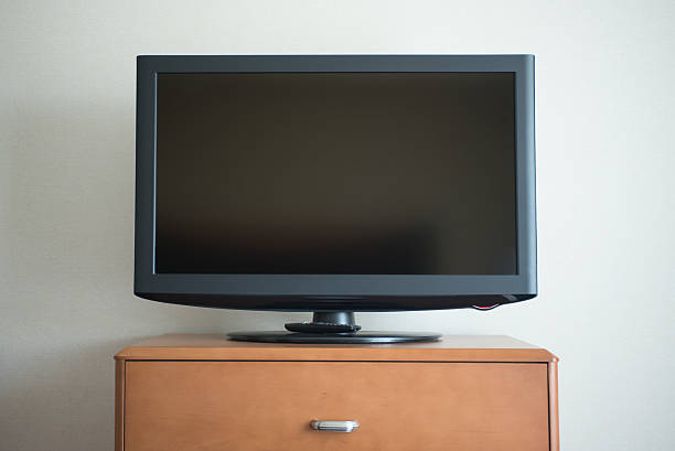 istock Flat screen TV on dresser 629494856