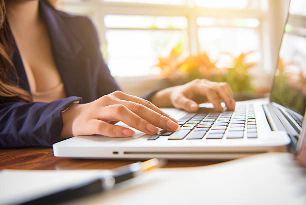 istock Bored young woman in the office working 629494932