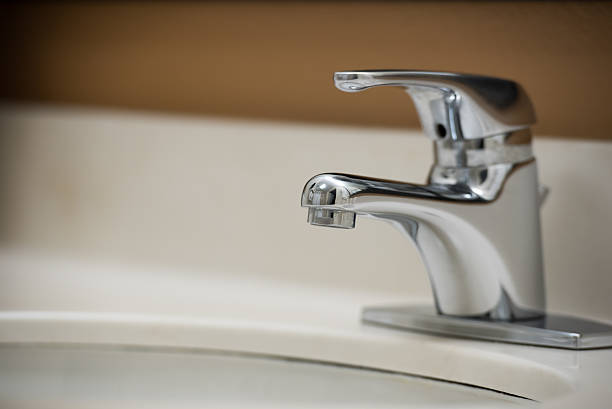 istock Bathroom sink faucet 629494942