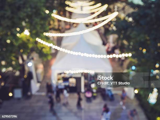Festival Event Party People Blurred Lights Decoration Background Stock Photo - Download Image Now
