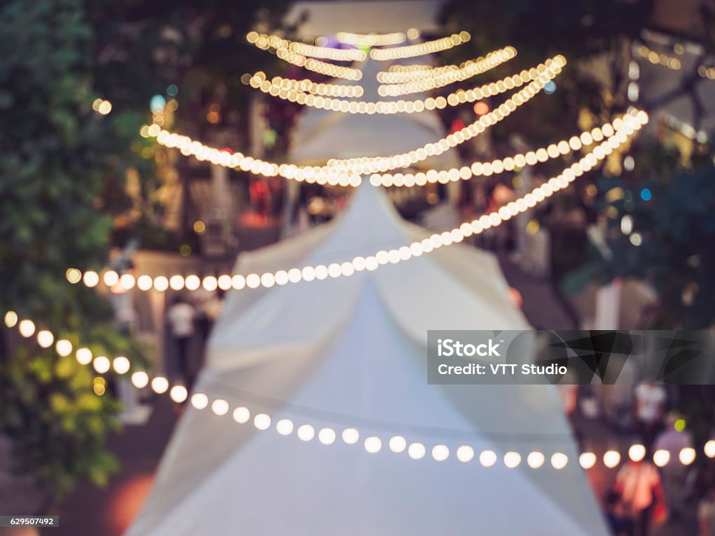 Festival Event Party Blurred People Background Lights decoration Festival Event Party Outdoor Blurred People Background Lights decoration Traditional Festival Stock Photo