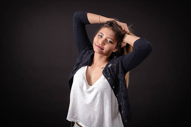 Beautiful woman doing different expressions in different sets of clothes: wake up