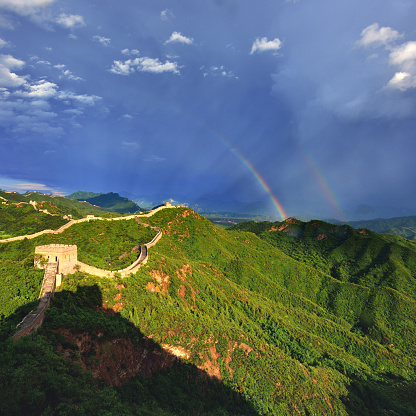 Great wall after thunderstorm, Beautiful double rainbow appears, China.
