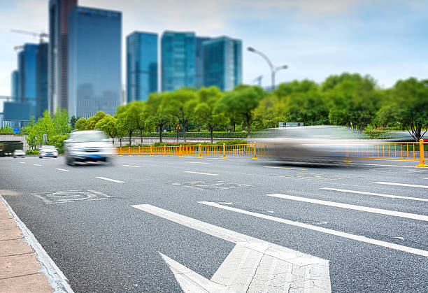 istock busy asphalt road in modern city under twilight 629527324