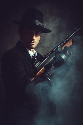 Portrait of a gangster with Tommy Gun