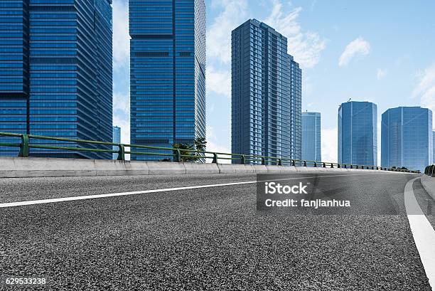 Empty Highway With Cityscape And Skyline Stock Photo - Download Image Now - Architecture, Asia, Asphalt