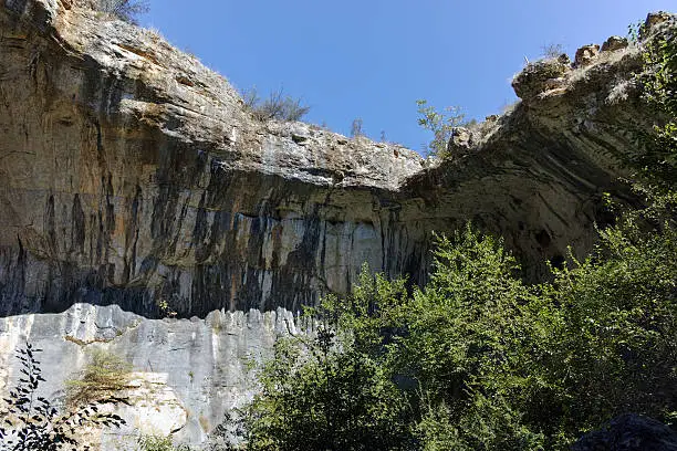 Photo of Outside view of Prohodna cave - Eyes of god, Bulgaria