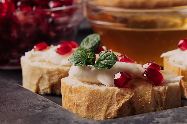 istock bread with cream cheese and pomegranate 629557820