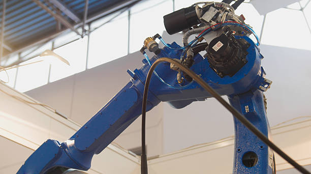 istock Automated machine - mechanical arm for industrial welding 629564862
