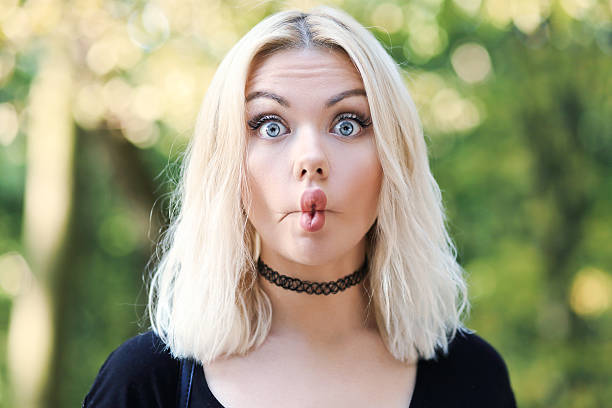istock woman with funny face 629565972