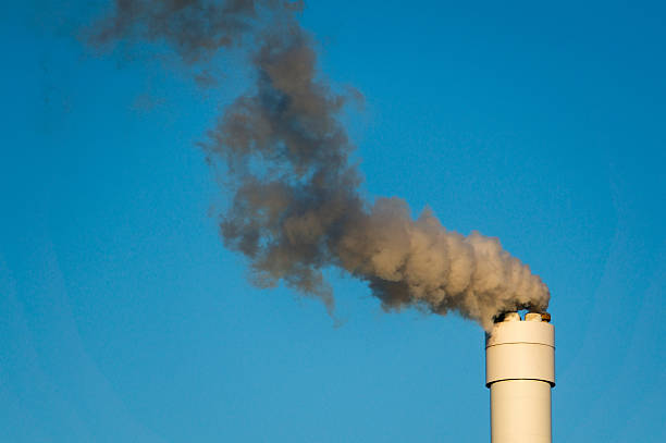 istock polluted smoke against a clear blue sky 629566458