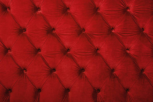 Red capitone tufted fabric upholstery texture Red velvet capitone textile background, retro Chesterfield style checkered soft tufted fabric furniture diamond pattern decoration with buttons, close up red velvet material stock pictures, royalty-free photos & images