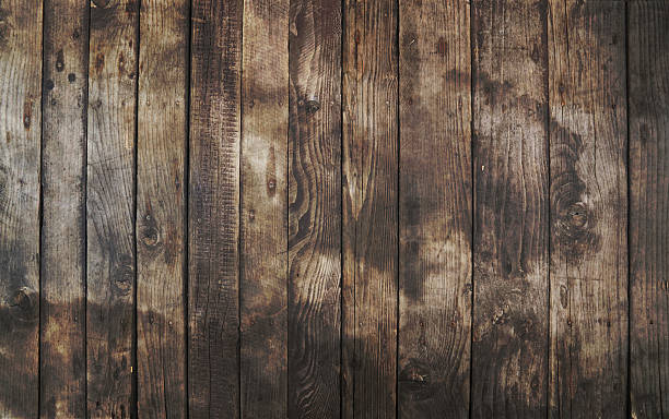 istock Old vintage dark brown wooden planks background 629569742