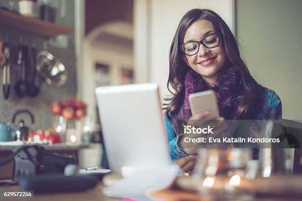 Young Woman At Home Stock Photo - Download Image Now - Purple, Office, One Woman Only
