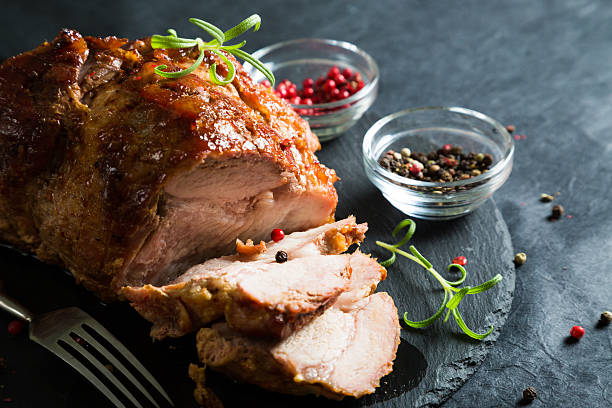 istock Baked ham with spices and herbs 629573186