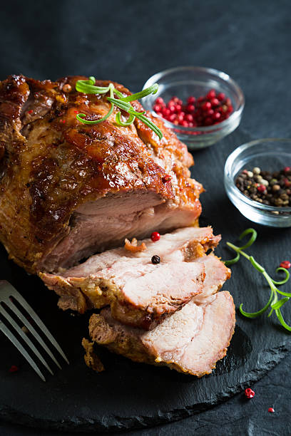istock Baked ham with spices and herbs 629573306
