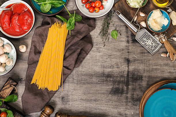 istock Raw ingredients for cooking for pasta on the wooden table 629573430