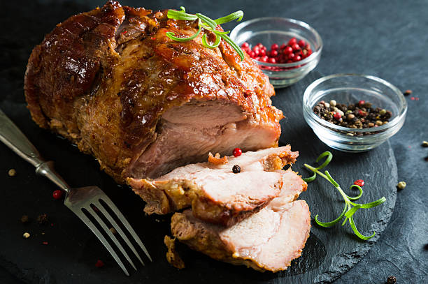 istock Baked ham with spices and herbs 629573644