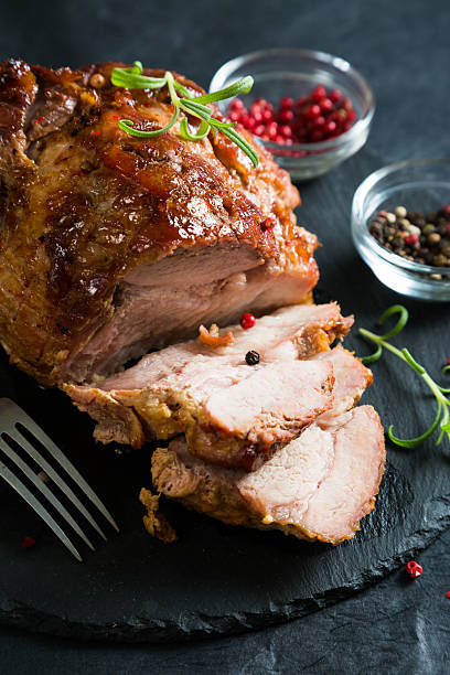 istock Baked ham with spices and herbs 629573946