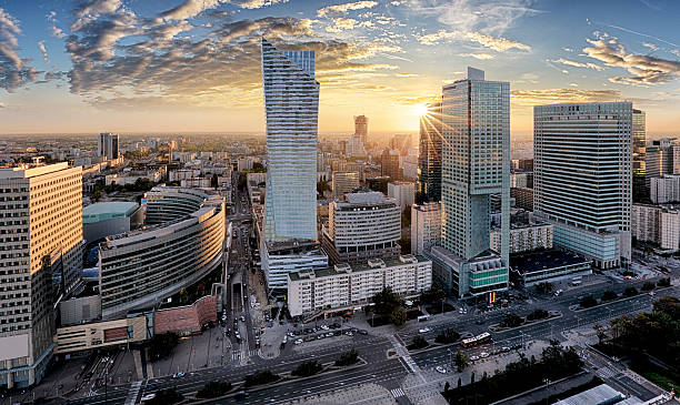 Warsaw city with modern skyscraper at sunset, Poland