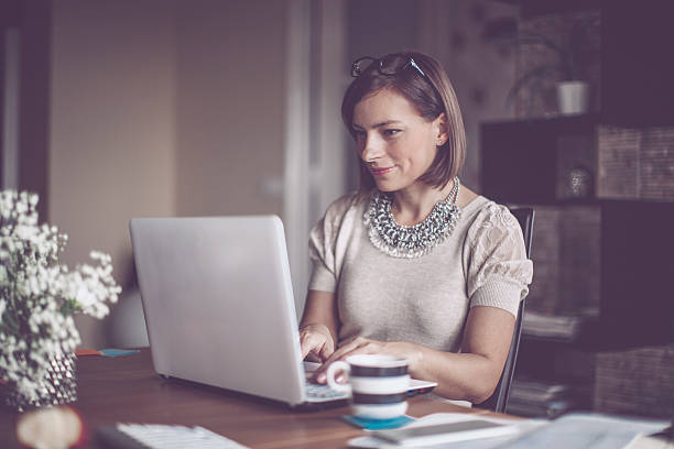 istock Beautiful young woman at home 629578576