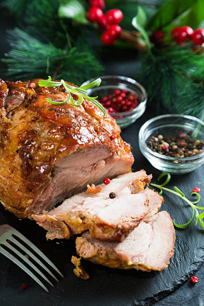 istock Christmas ham with spices and herbs 629578636